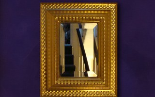 Water-gilded bevelled mirror with 23.5 carat yellow gold